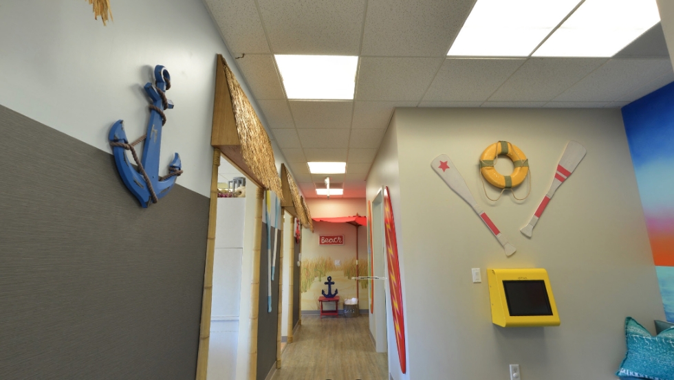 Hallway with nautical anchor decorations on walls