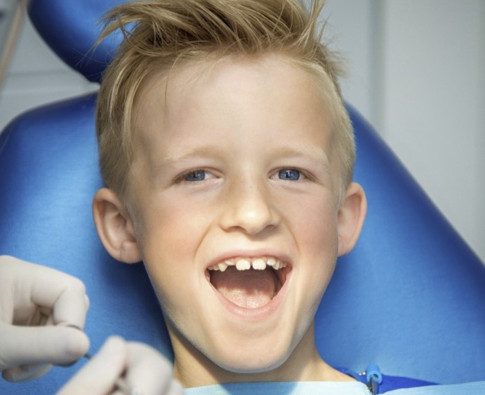 Young boy smiling in Pleasanton pediatric dental office