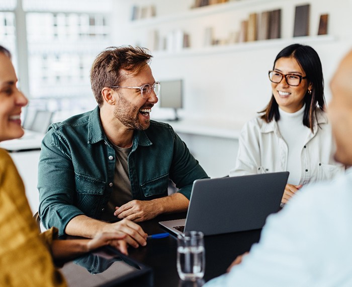 Group of colleagues smiling in office