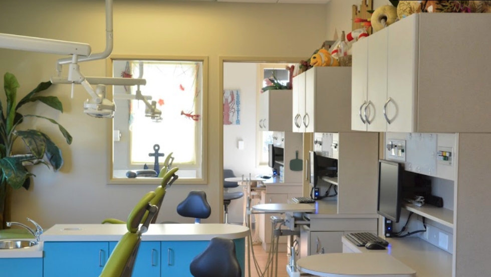 Row of computers and dental chairs