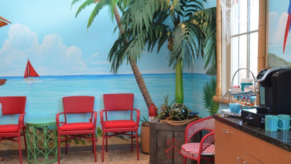 Red chairs in waiting area