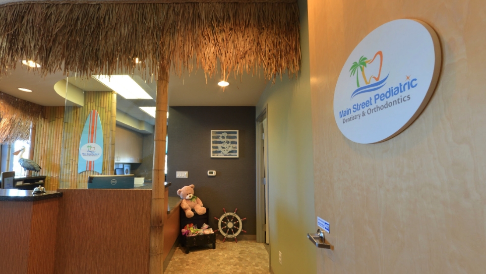 Main Street Pediatric Dentistry and Orthodontics of Pleasanton sign on wall