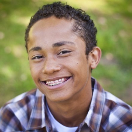 Smiling teenage boy with braces